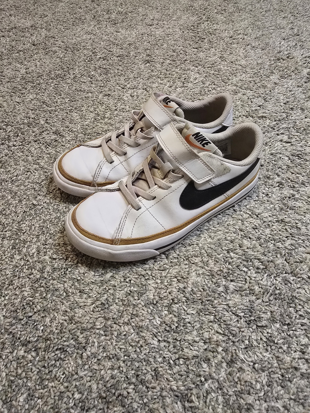 Nike Kids White Sneakers with Black Swoosh and Tan Trim
